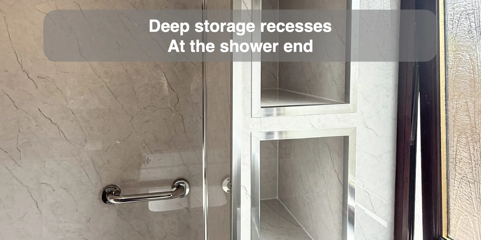 Deep storage recesses — At the shower end