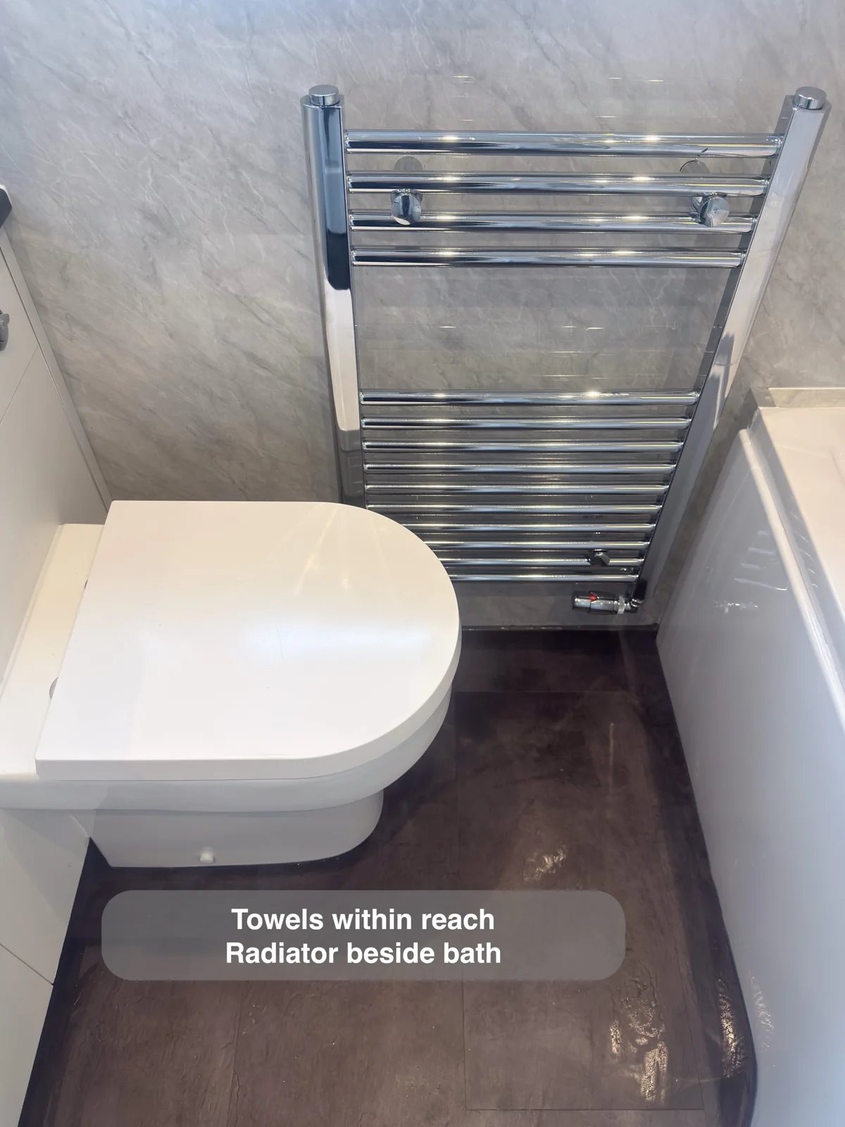 Aberdeen bathroom: towel radiator beside the bath