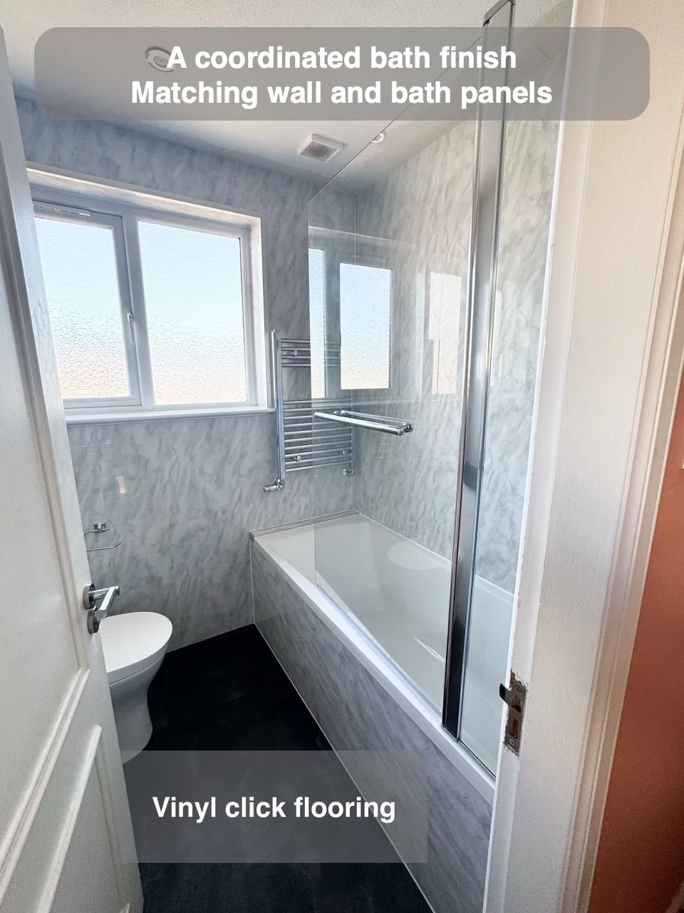 A coordinated bath finish — Matching wall and bath panels