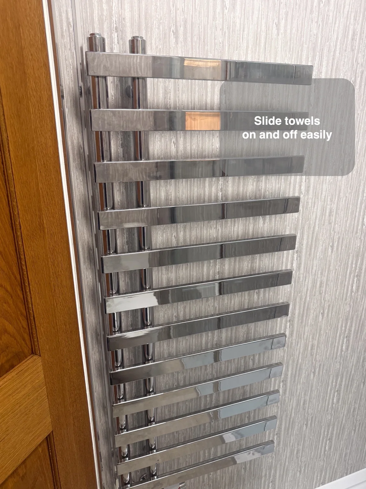 An open-ended rail makes towels easier to hang