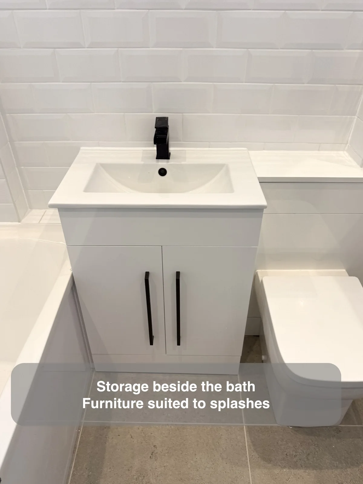 Keep storage beside the bath by choosing the right furniture — completed bathroom project with benefit callouts