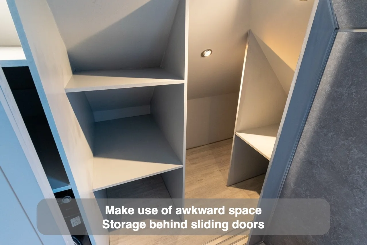 Make use of awkward space — Storage behind sliding doors