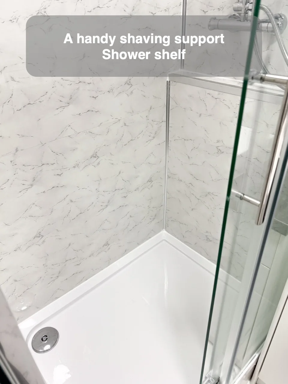 A handy shaving support — Shower shelf