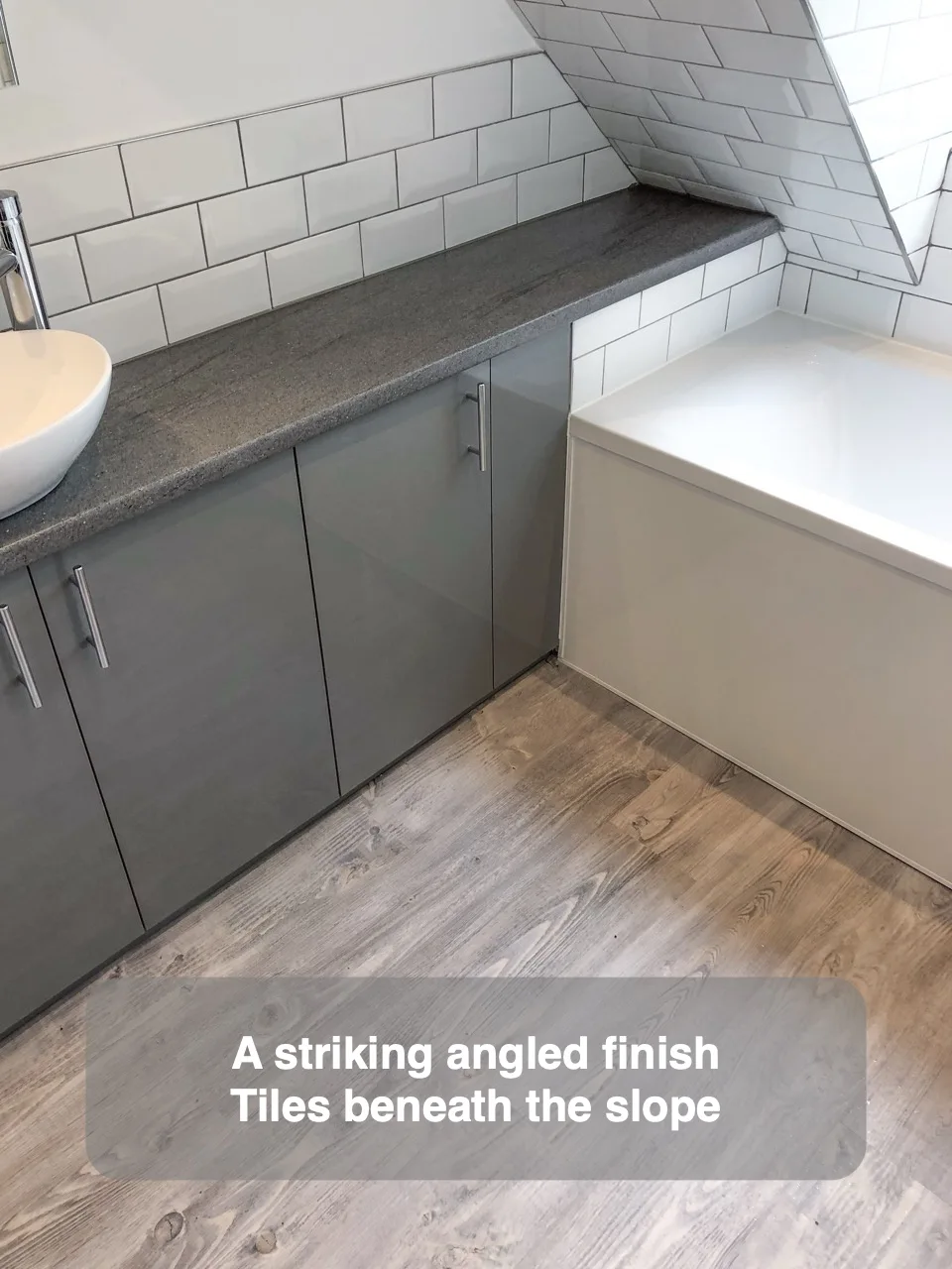 A striking angled finish — Tiles beneath the slope