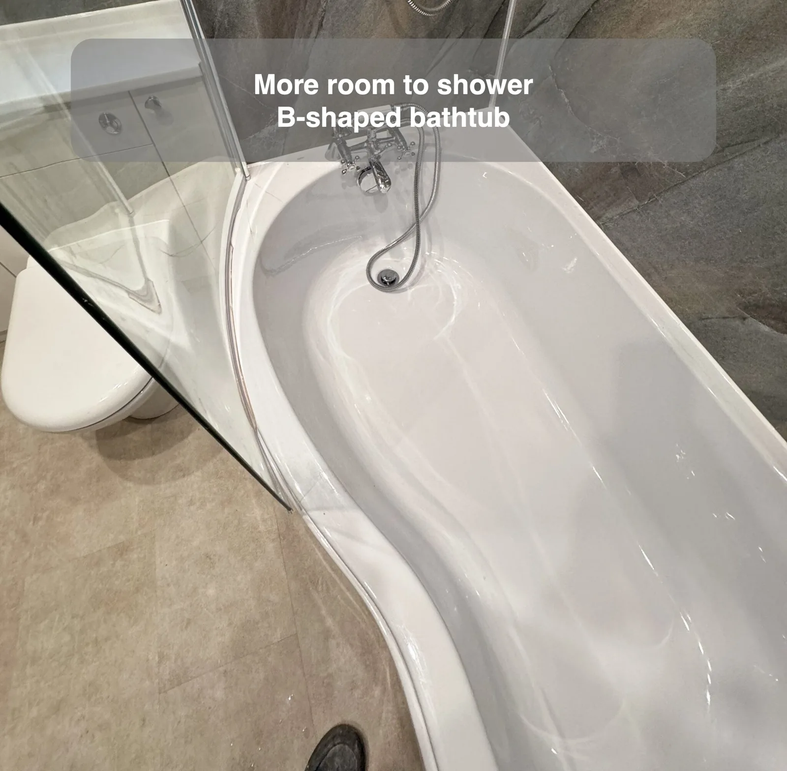 More room to shower — B-shaped bathtub