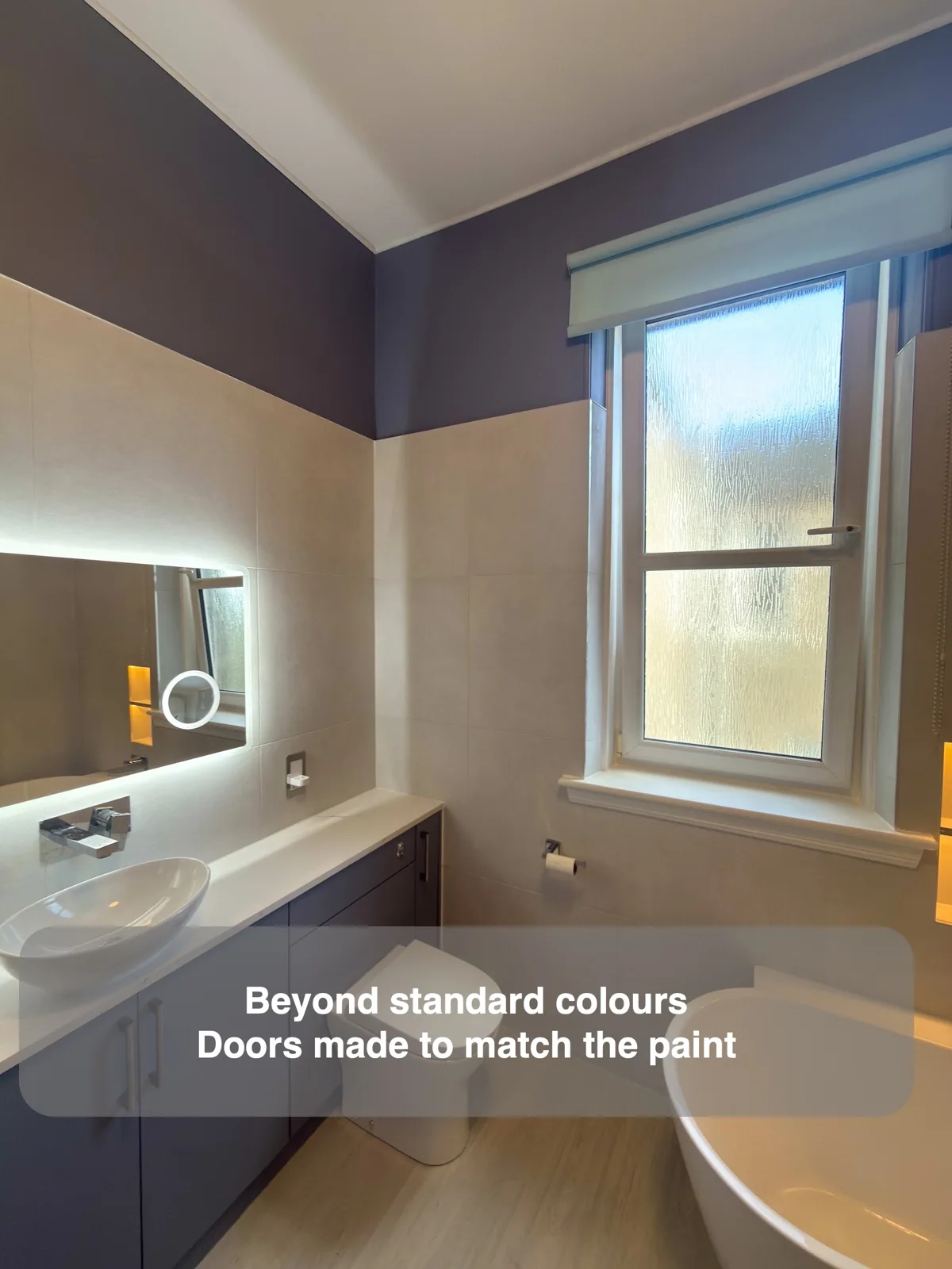 Have cupboard doors made to match your wall colour — completed bathroom project with benefit callouts