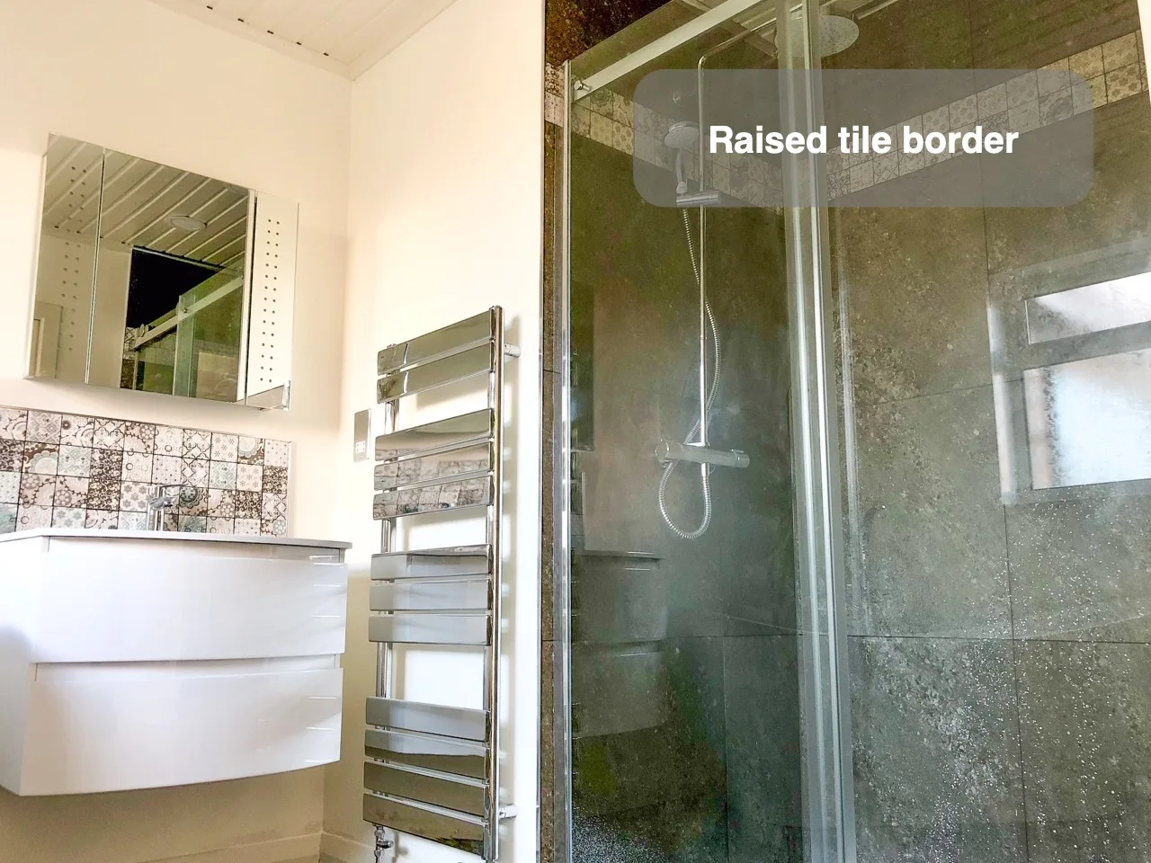 Raised tile border