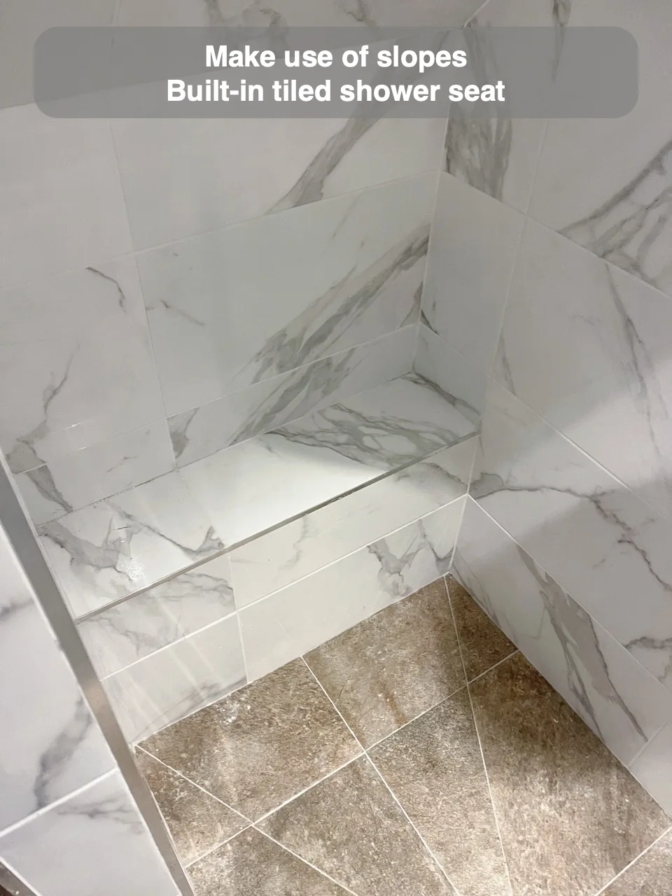 Make use of slopes — Built-in tiled shower seat
