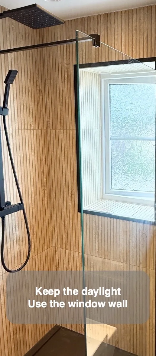 Let the shower share the window wall