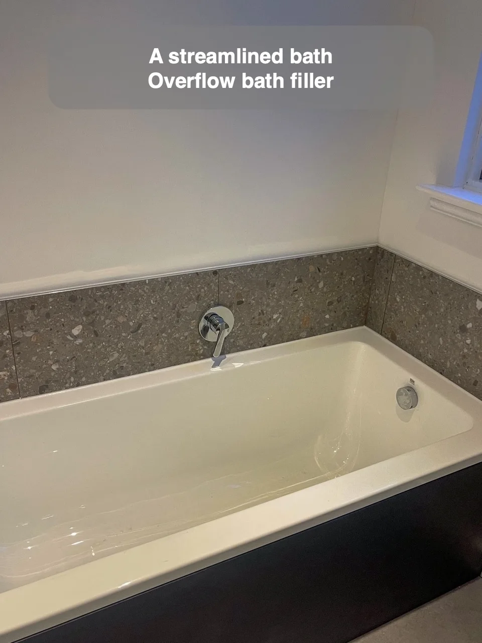 A streamlined bath — Overflow bath filler