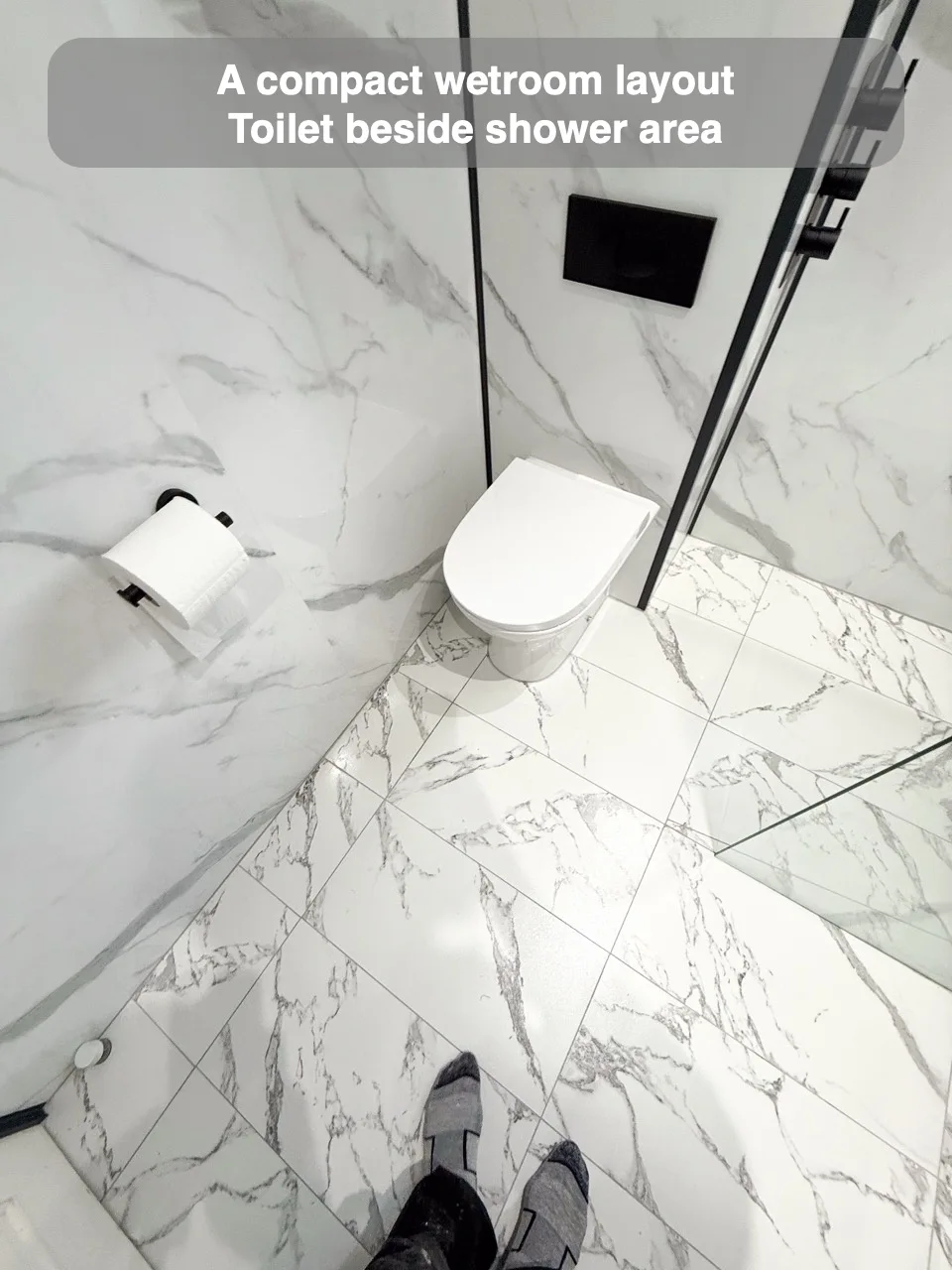 A compact wetroom layout — Toilet beside shower area