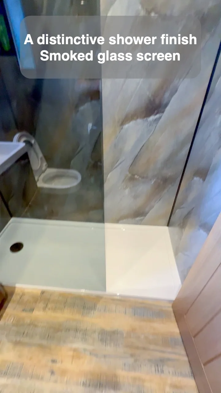 A distinctive shower finish — Smoked glass screen