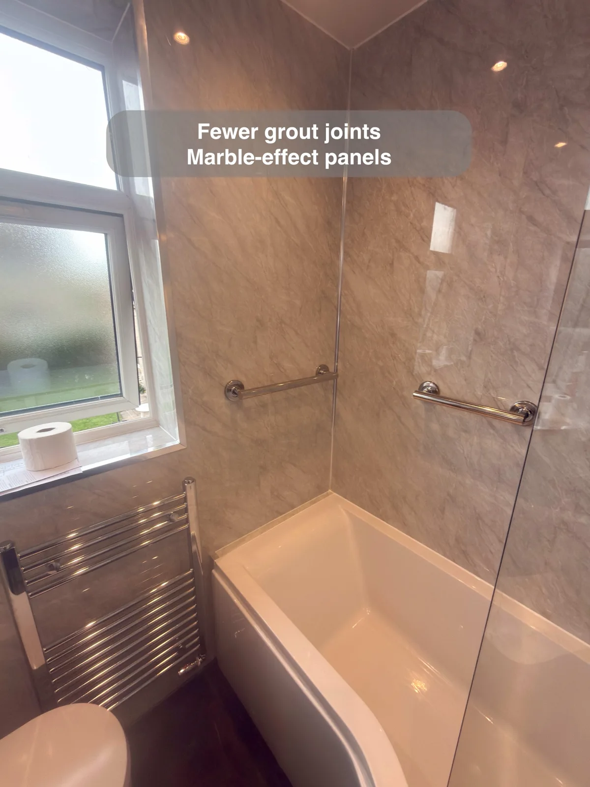 Aberdeen bathroom: marble effect panels bath corner