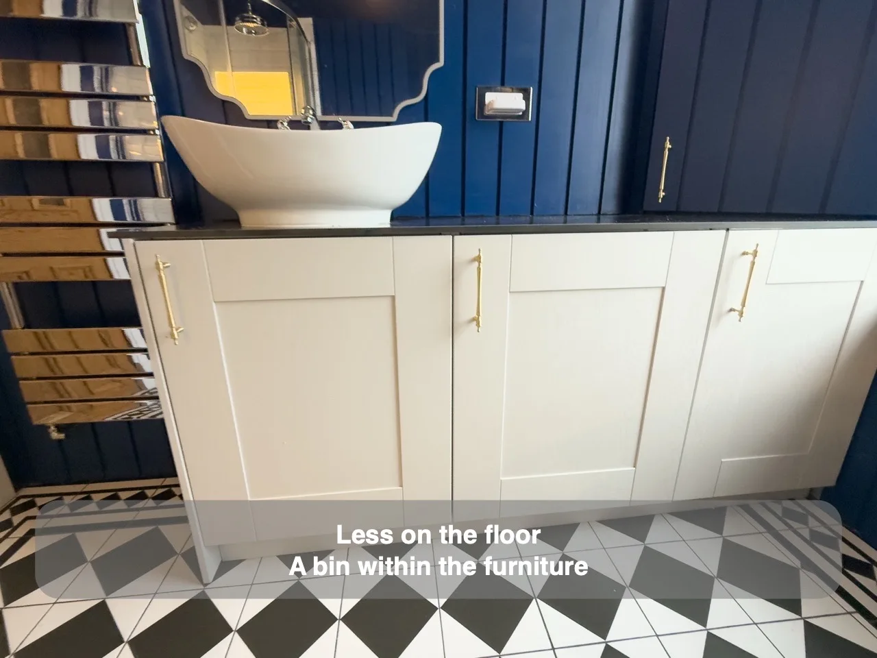 Give the bathroom bin a place inside the furniture