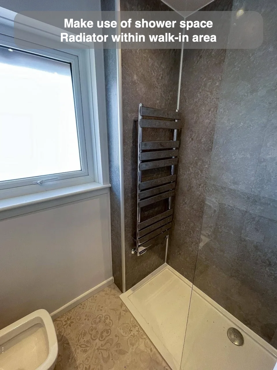 Make use of shower space — Radiator within walk-in area