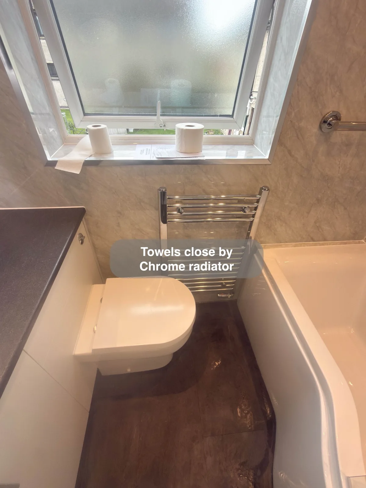 Aberdeen bathroom: window wall bath toilet and radiator