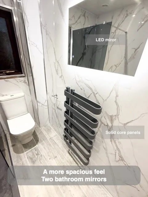 A more spacious feel — Two bathroom mirrors