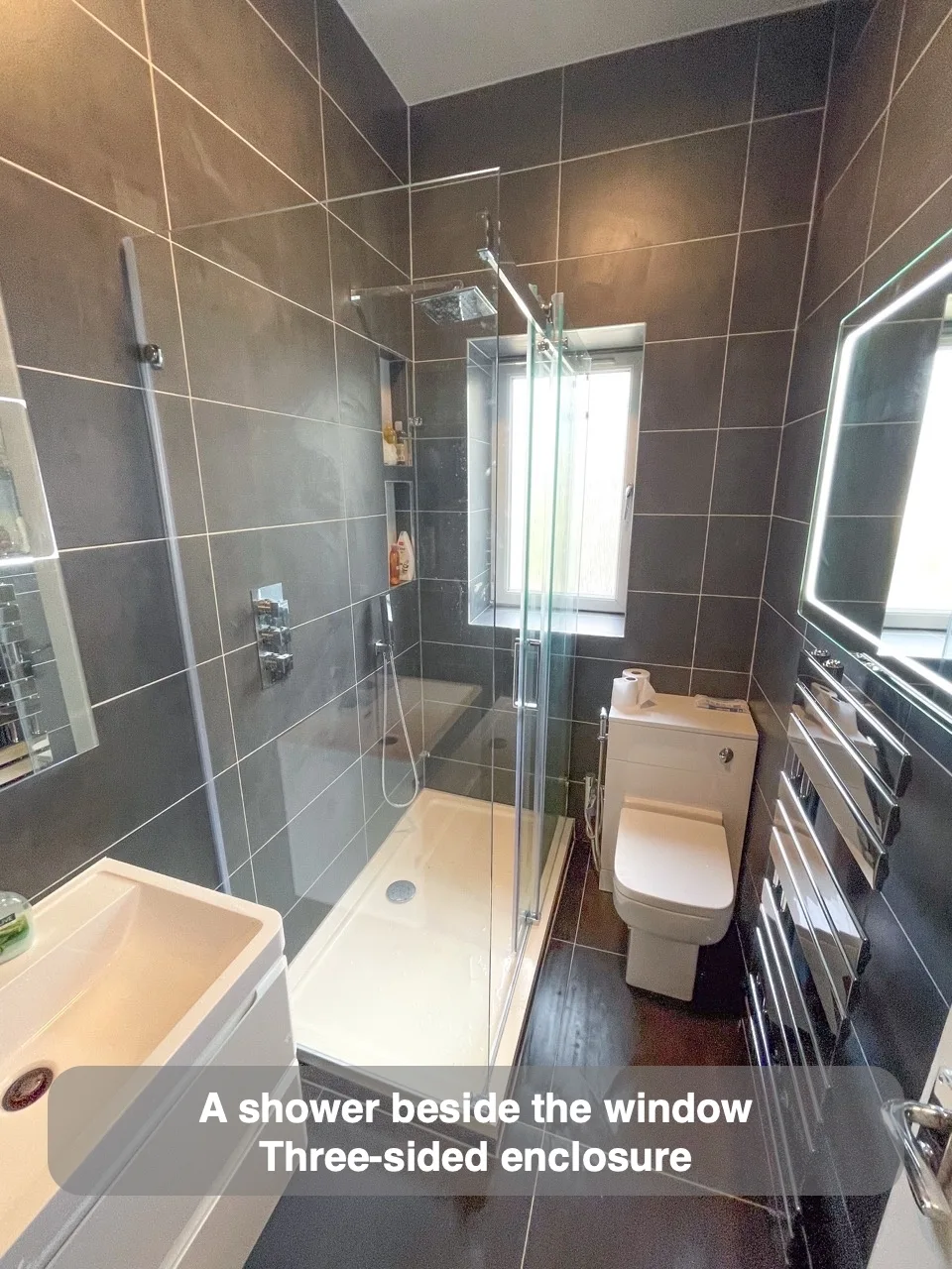 A shower beside the window — Three-sided enclosure