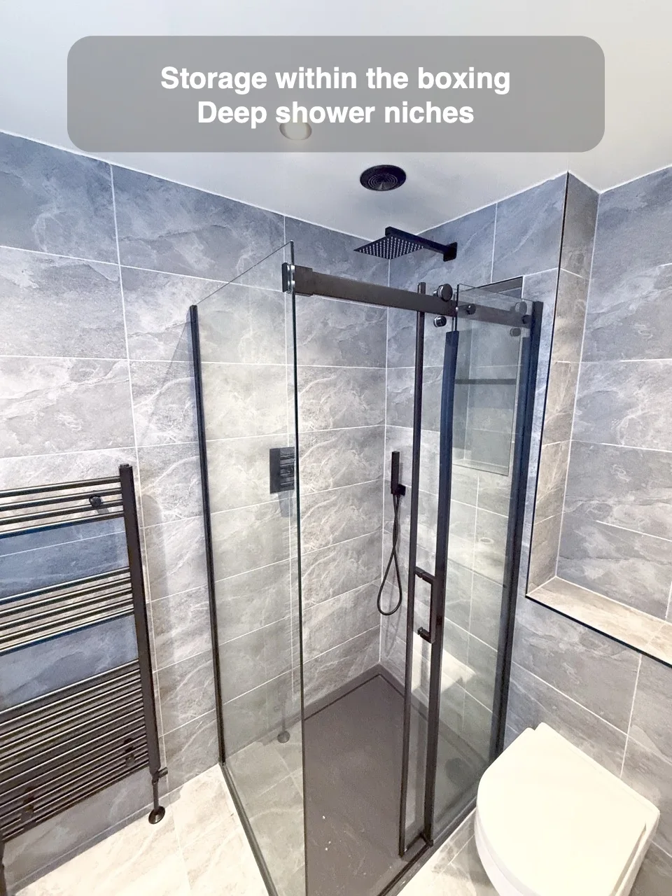 Storage within the boxing — Deep shower niches