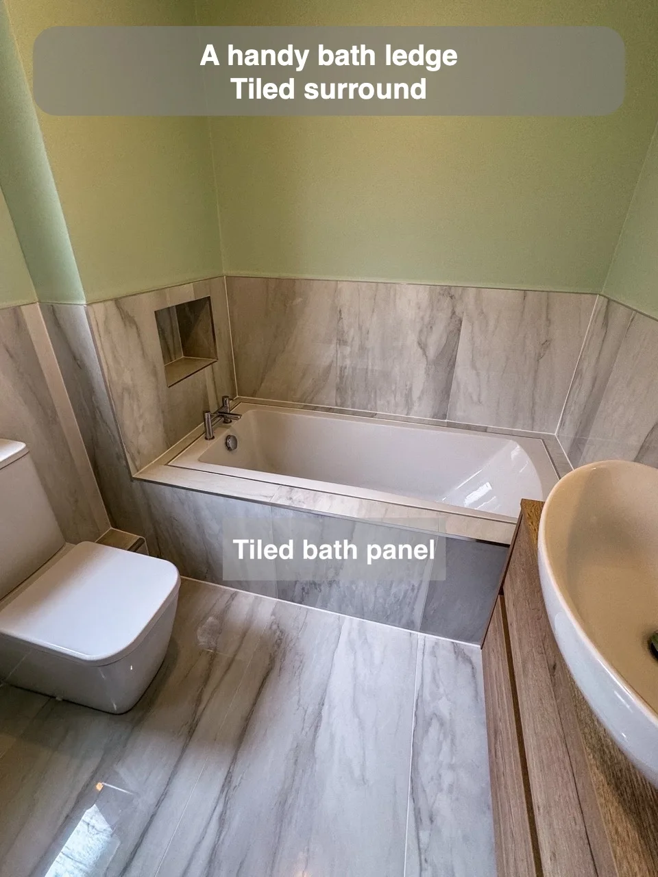 A handy bath ledge — Tiled surround