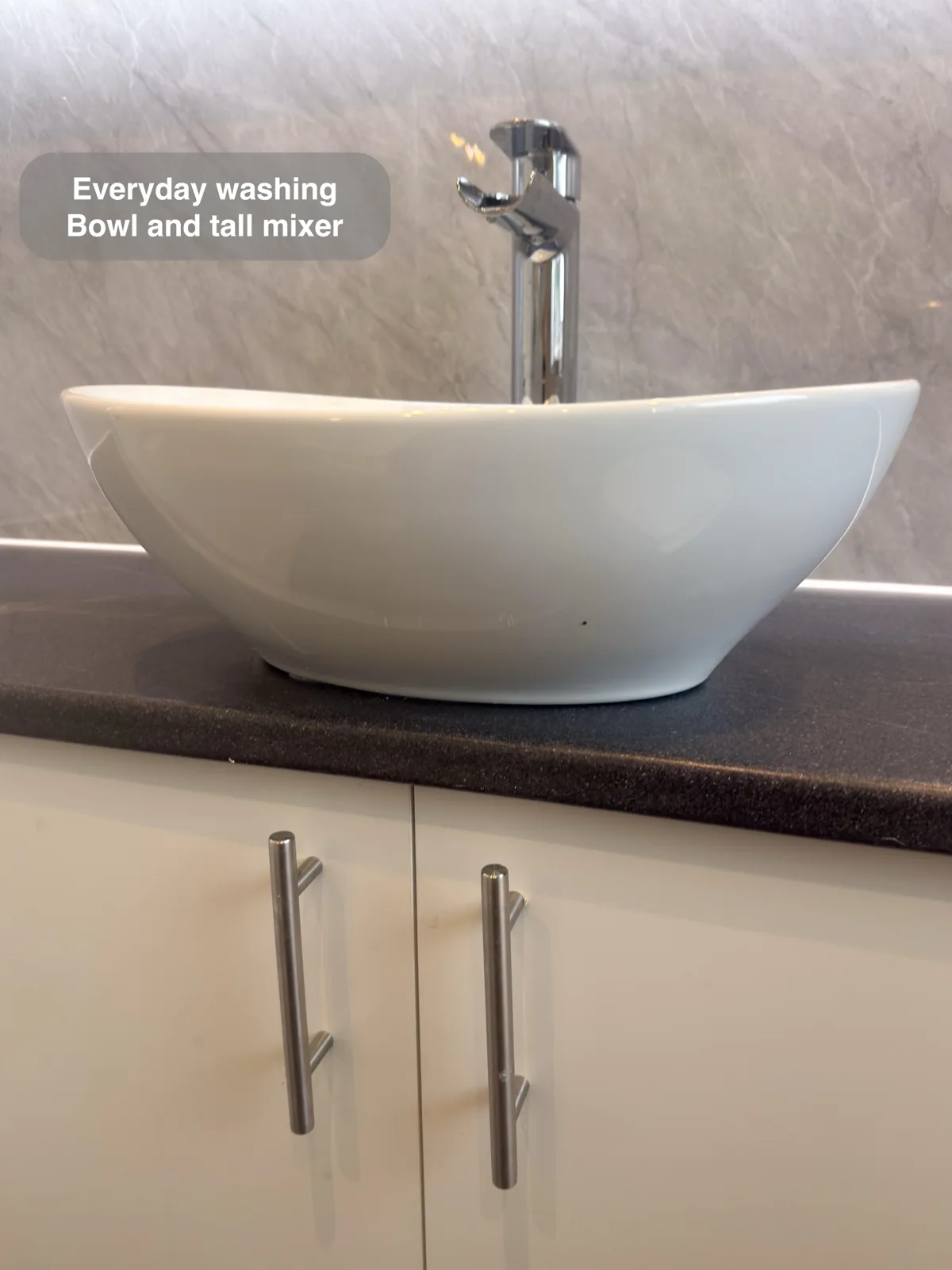 Aberdeen bathroom: countertop basin chrome tap