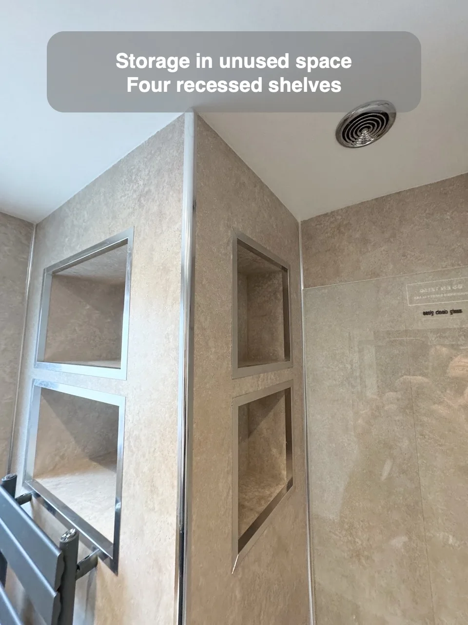 Storage in unused space — Four recessed shelves