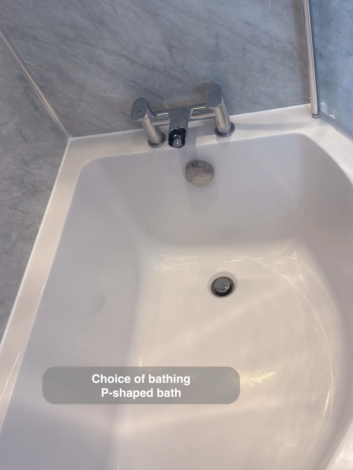 Aberdeen bathroom: p shaped bath wider shower end