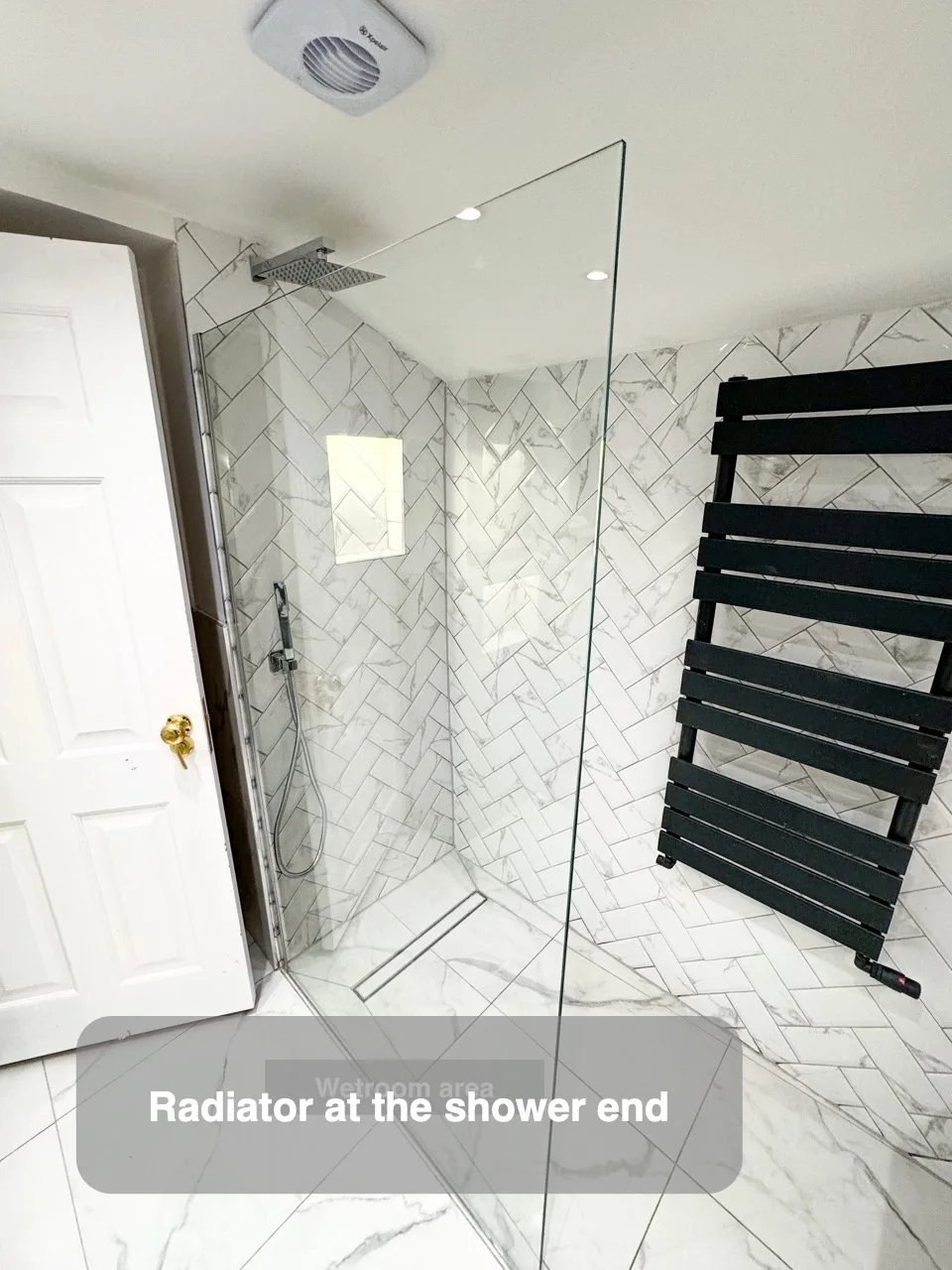 Radiator at the shower end
