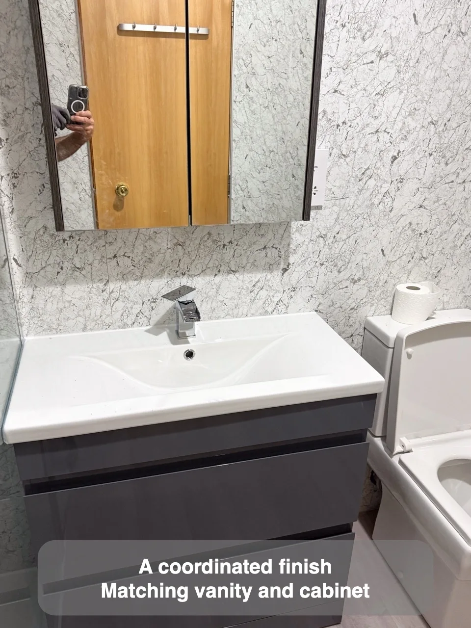 A coordinated finish — Matching vanity and cabinet