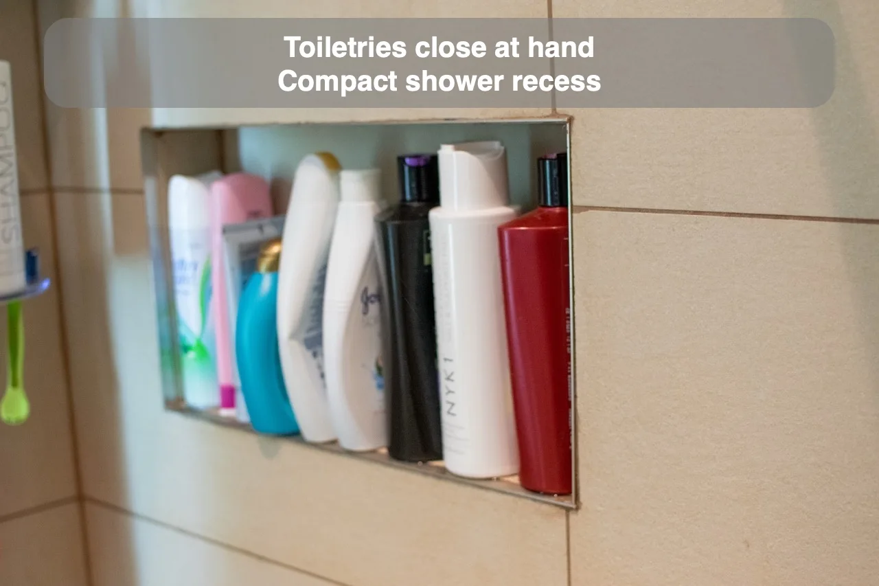 Toiletries close at hand — Compact shower recess