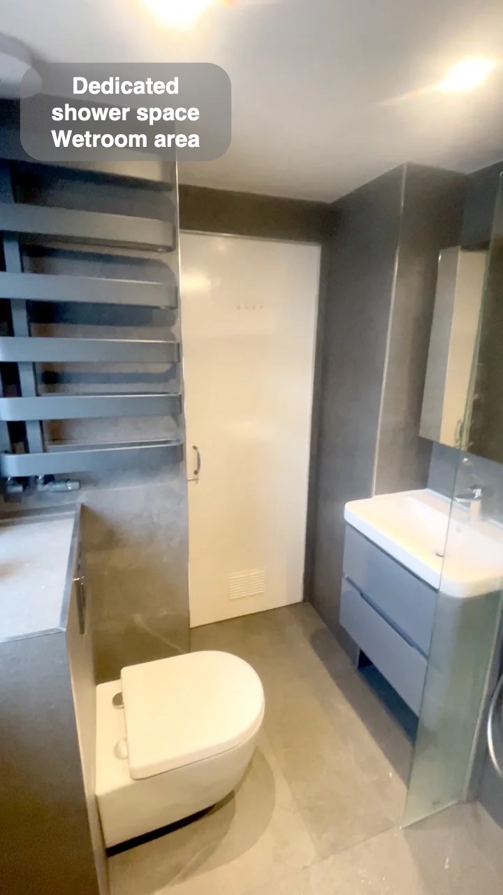 A defined wetroom area in the completed West End, Aberdeen bathroom
