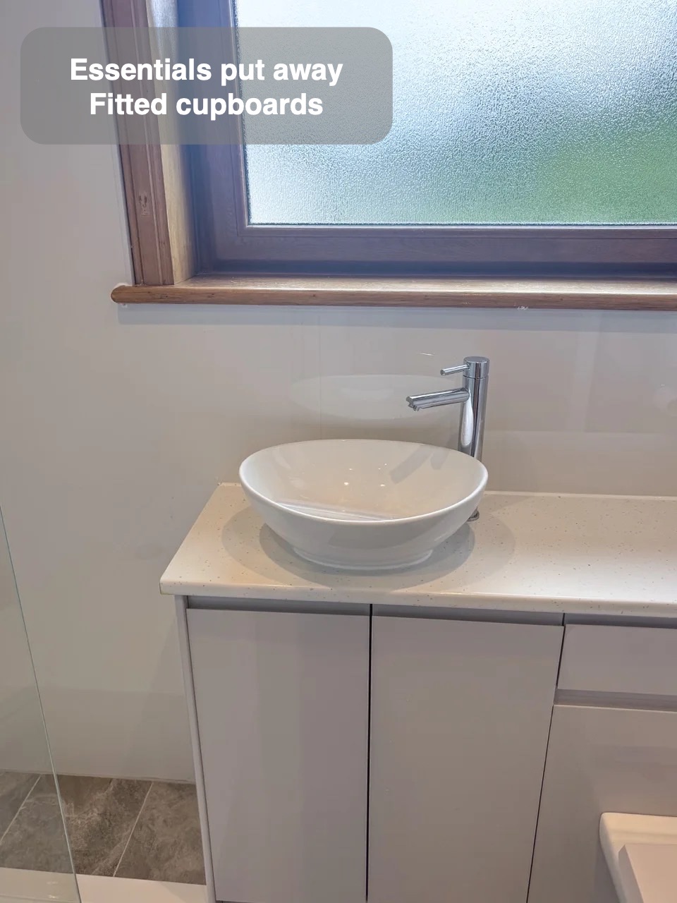 Storage fitted into the layout in Mastrick, Aberdeen bathroom