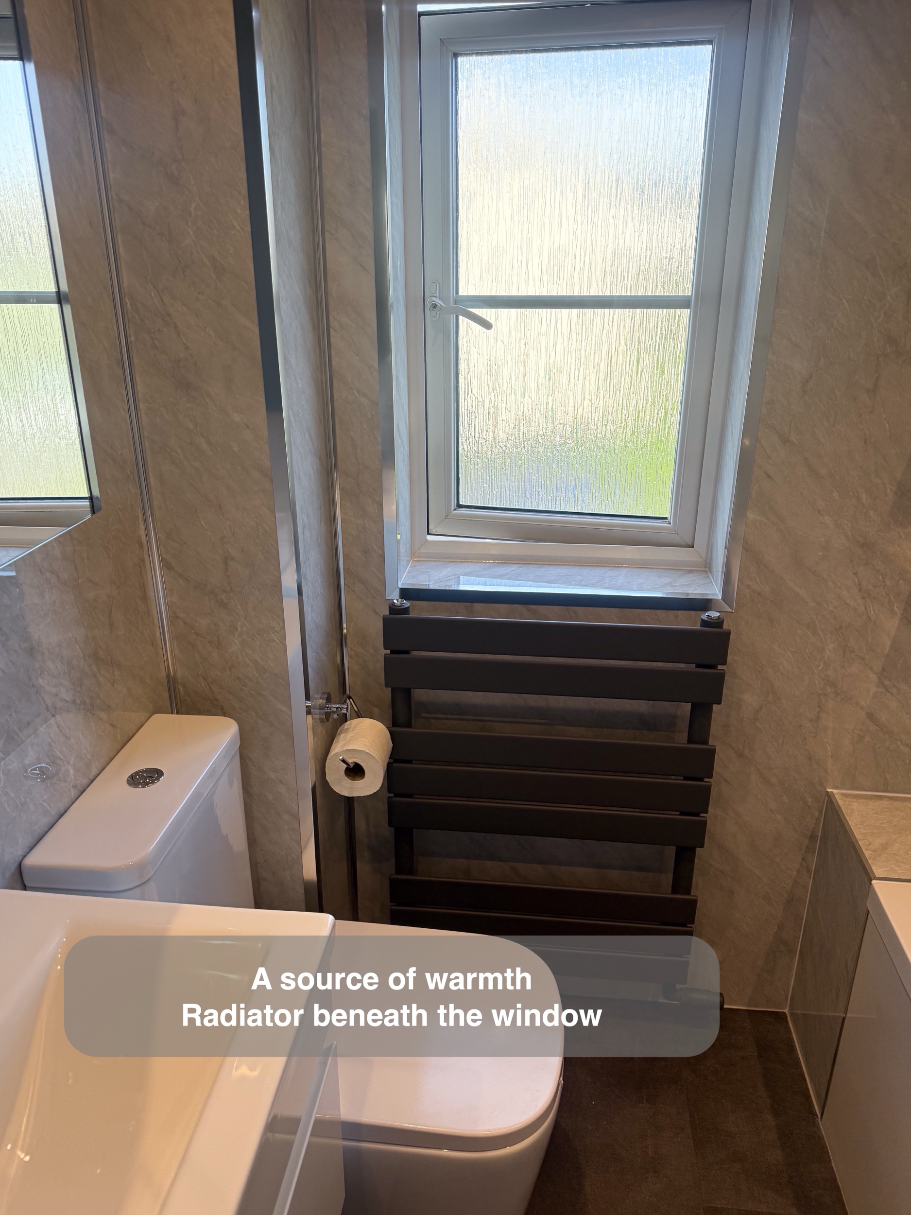 Inverurie bathroom: radiator beneath the window