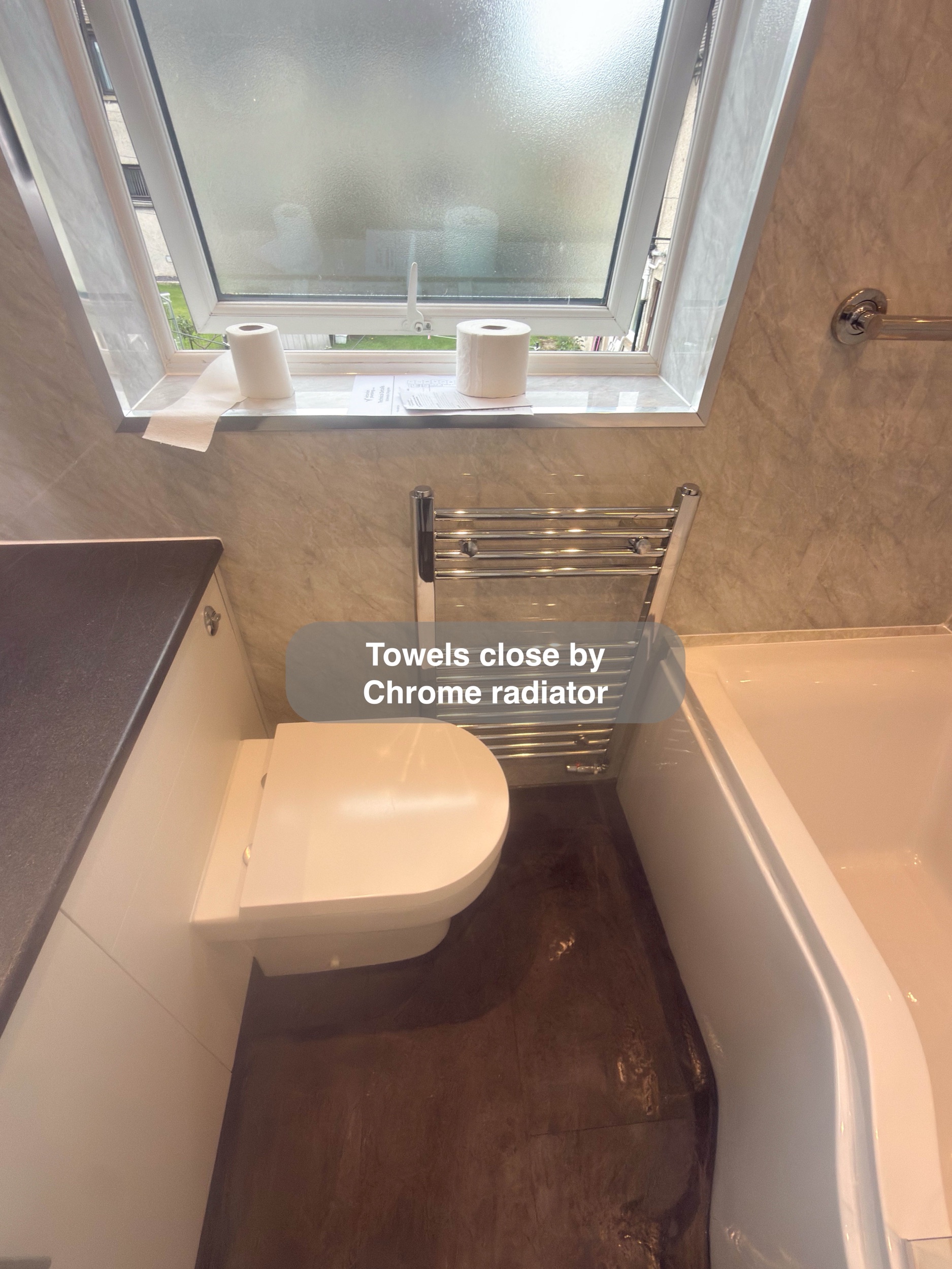Aberdeen bathroom: window wall bath toilet and radiator