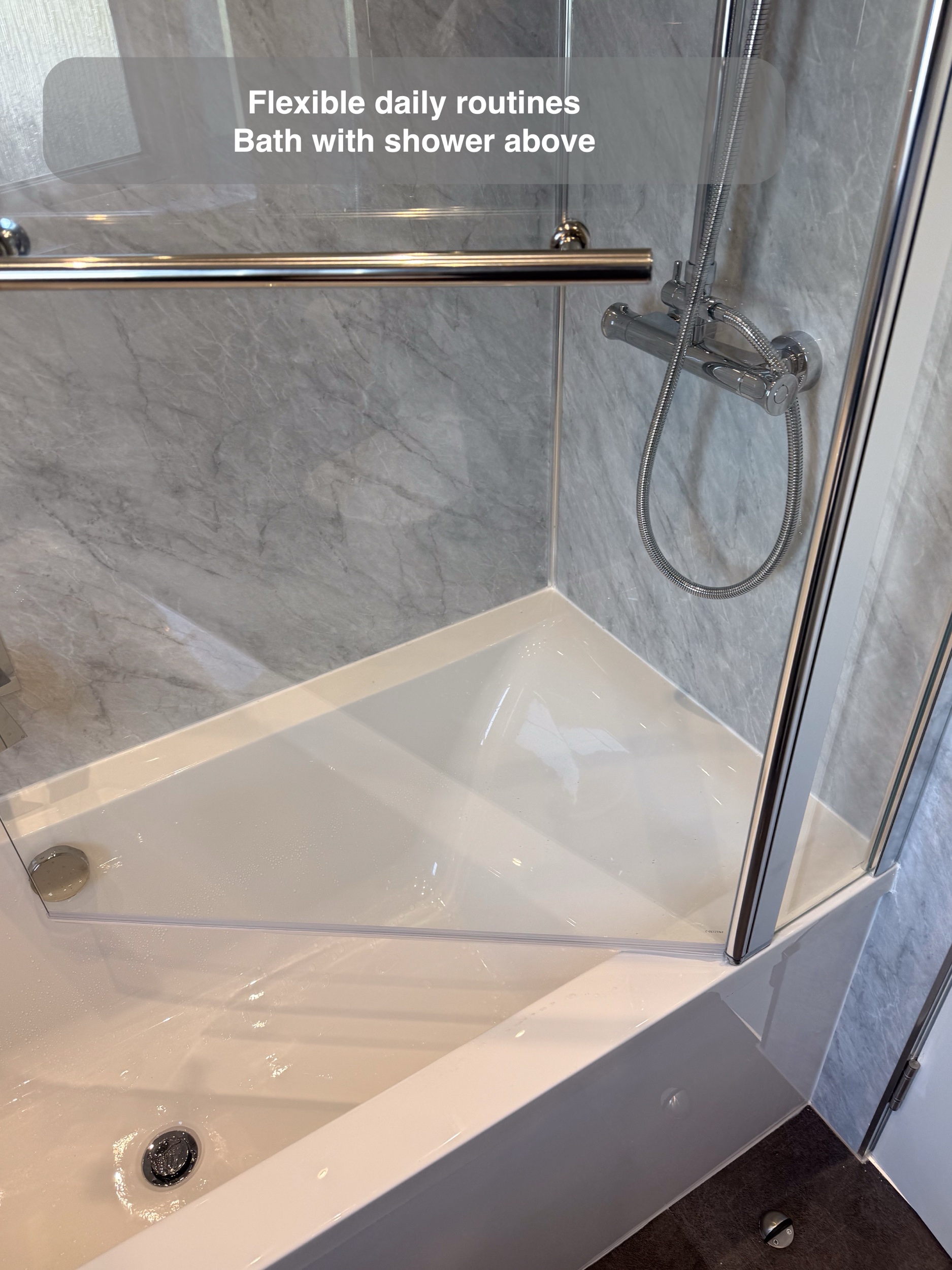 Inverurie bathroom: bath and glass shower screen
