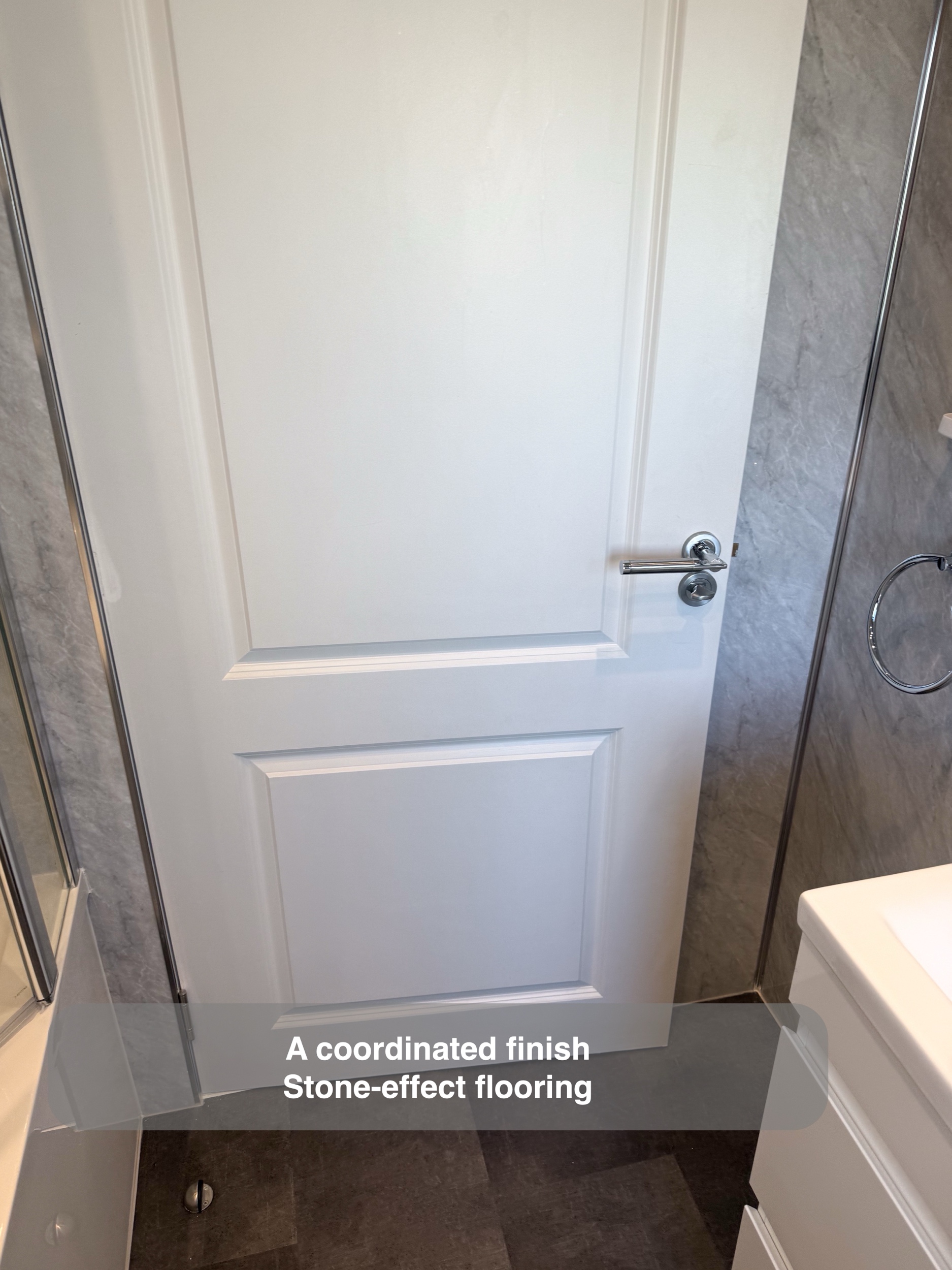 Inverurie bathroom: door and stone effect flooring