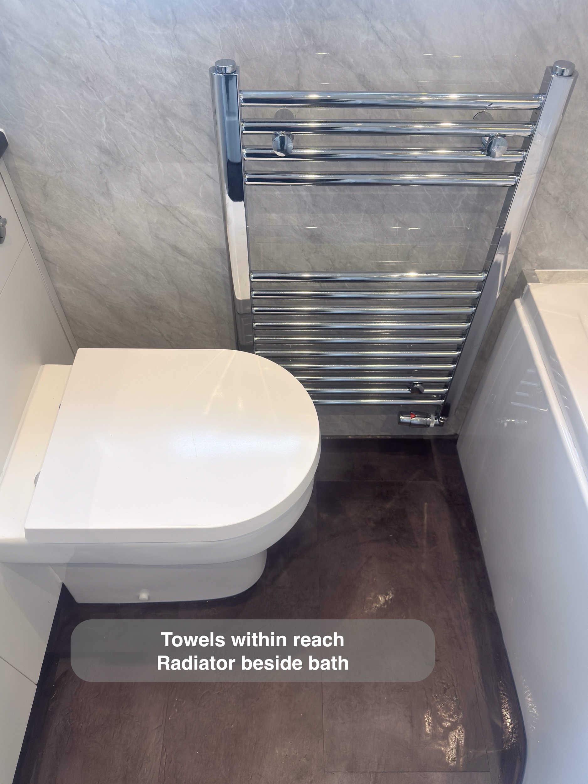 Aberdeen bathroom: towel radiator beside the bath