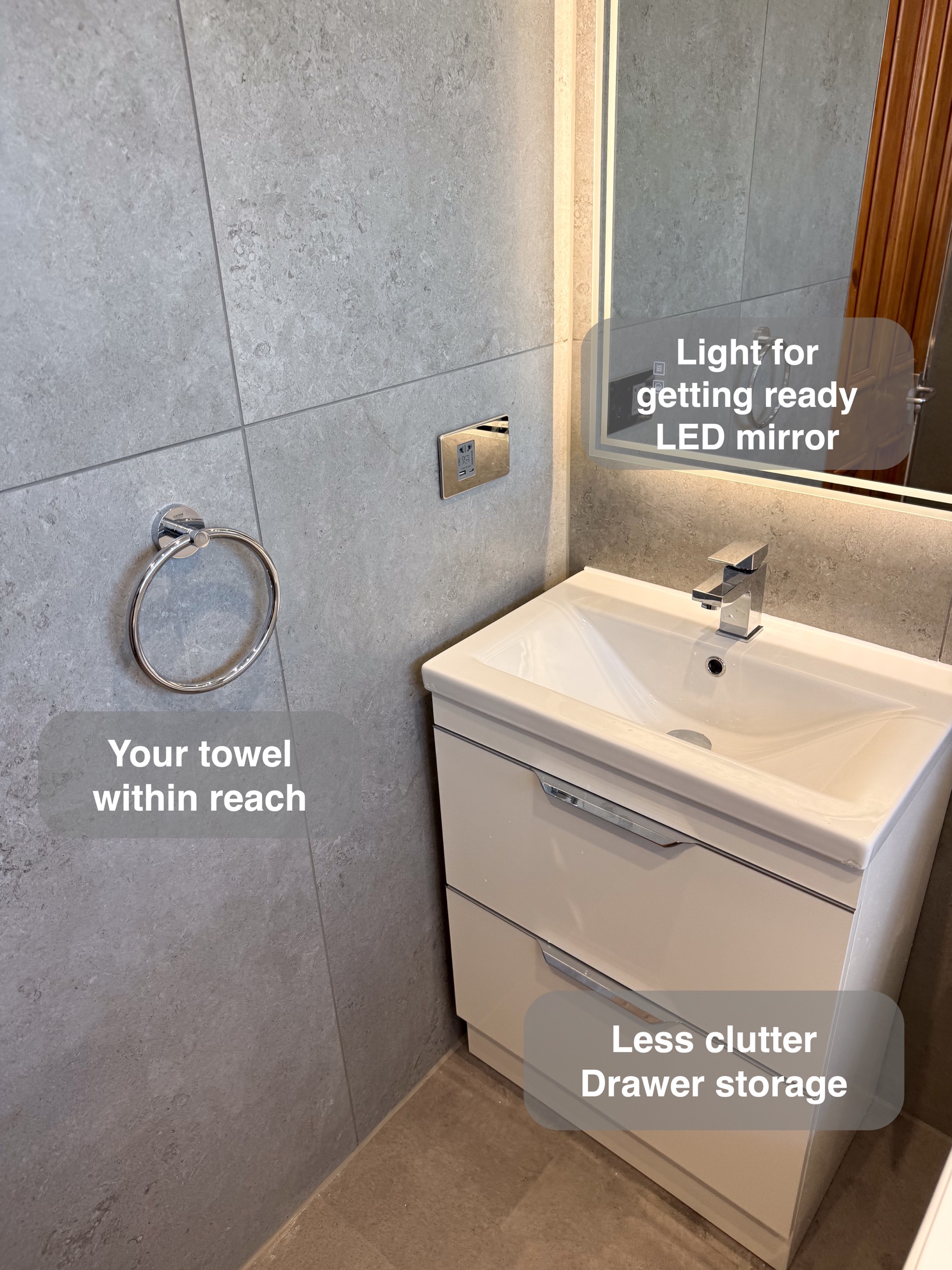 Drawer vanity and towel ring in the completed Aberdeen bathroom, with benefit callouts.