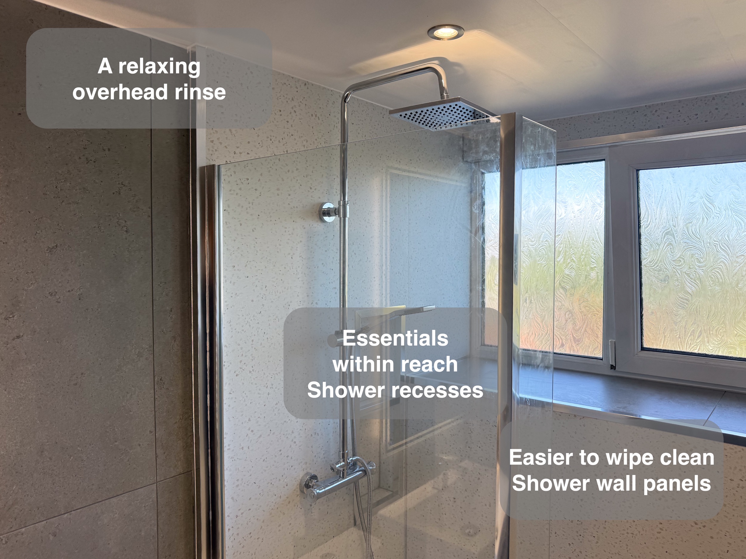 Overhead shower and recessed shelves in the completed Aberdeen bathroom, with benefit callouts.